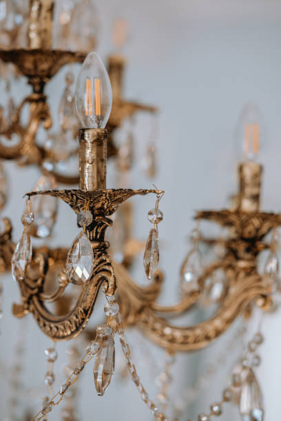 istock Elegant vintage chandelier adorned with crystals illuminated in soft light 2186543016