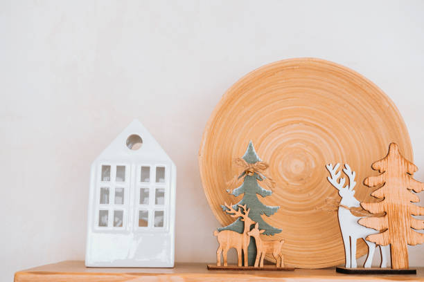 istock Decorative wooden and ceramic ornaments on a shelf with natural textures 2186544096