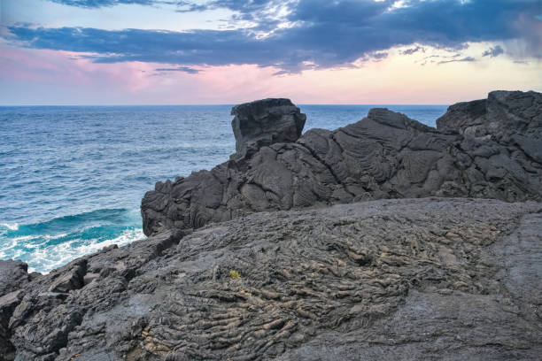 La Reunion, the volcanic garden, landscape at Saint-Philippe, cliff formed by ancient lava on the sea