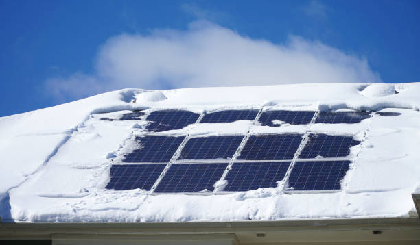 istock solar panel on the roof covered by snow after blizzard in winter 2186569878