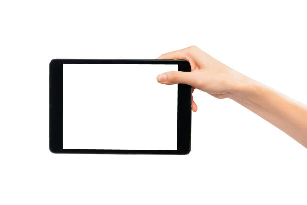 istock Clipping path, Hand holding the black digital tablet with mockup of blank screen on isolated white background. 2186572433