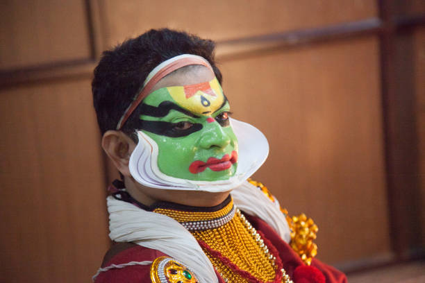 istock Kathakali artist makeup shots 2186574386