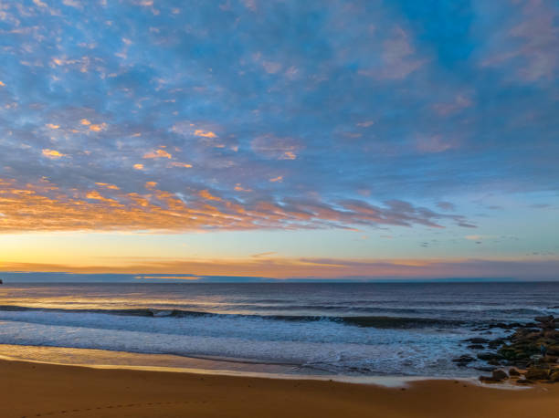istock Winter seascape views over the beach with high and medium cloud cover 2186581804