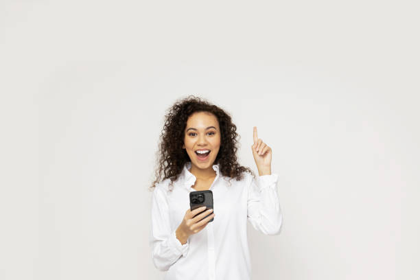 istock Young attractive girl with a smartphone in her hands 2186582646