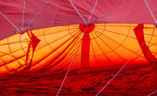 istock A red balloon with a hole in it 2186582661