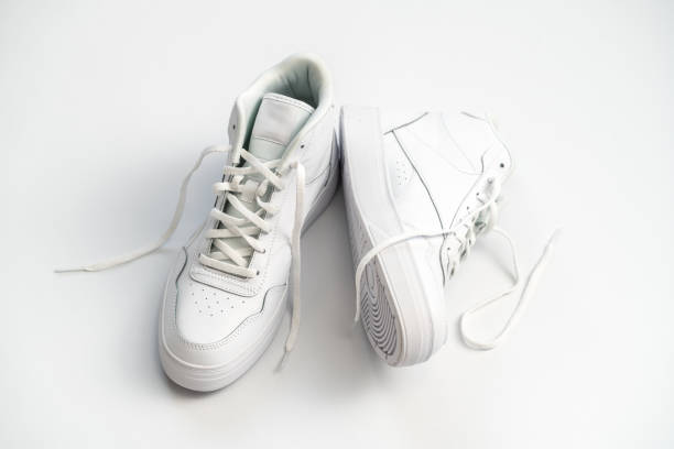 Minimalist White High-Top Sneakers on a Simple White Background