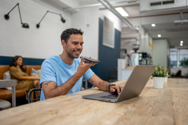 istock Male Professional Using Voice Control to Streamline Workflow Across Smart Devices 2186590498