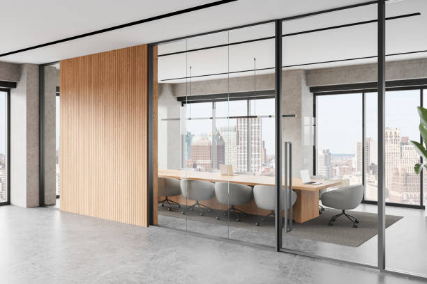 istock Modern office meeting room with glass walls and wooden accent panel. 3D Rendering 2186591414