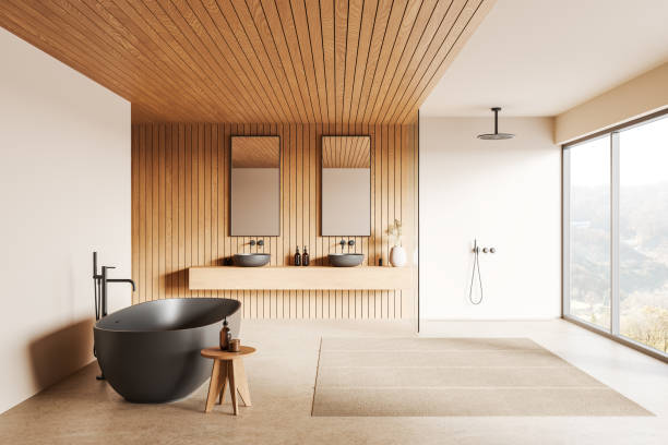 Luxury hotel bathroom interior with tub, double sink and shower, window