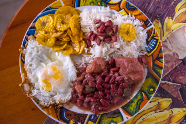 Rice, with beans, banana and fried eggs, in Cuba