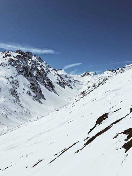istock Breathtaking winter landscape with snow-capped mountains 2186594932