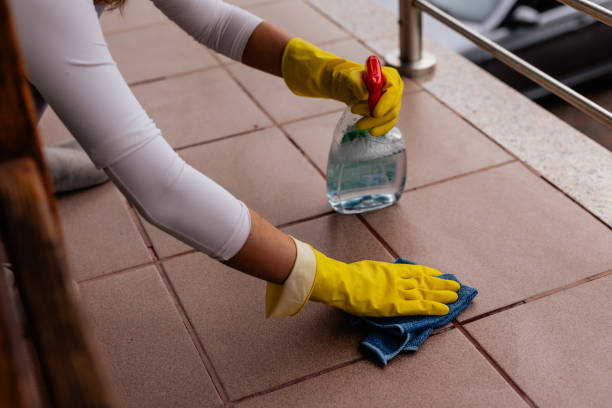 istock Woman cleaning tile floors outdoors, spring cleaning 2186597333