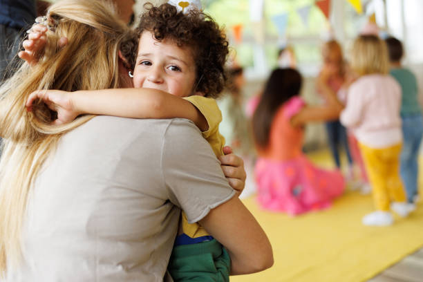 istock A mother hugs a crying boy in the playroom 2186604841
