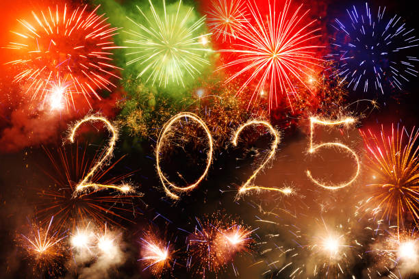 istock Happy new year 2025 written with Sparkle colorful firework on black background 2186606369