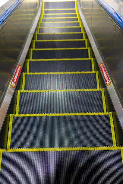 istock Urban Escalator with Safety Markings 2186607280