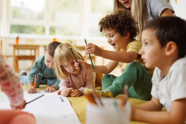 istock Children draw with crayons in kindergarten 2186608863