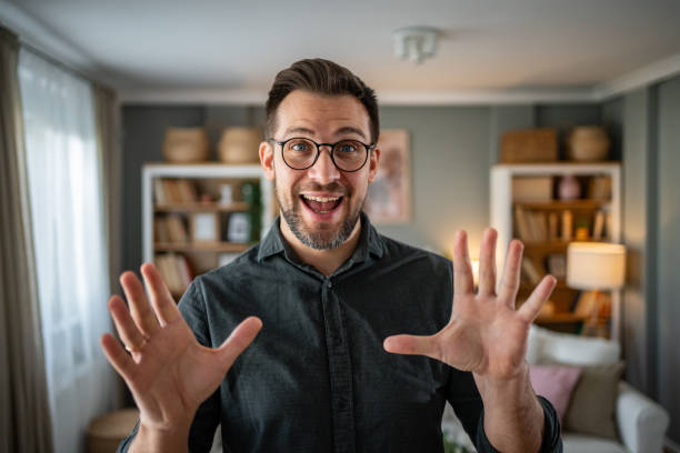 istock Man talking and looking at camera, recording video for his vlog 2186609299