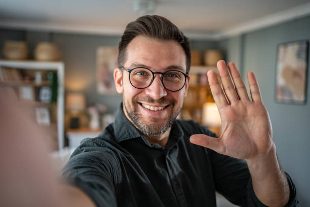 istock Man talking and looking at camera, recording video for his vlog 2186609302