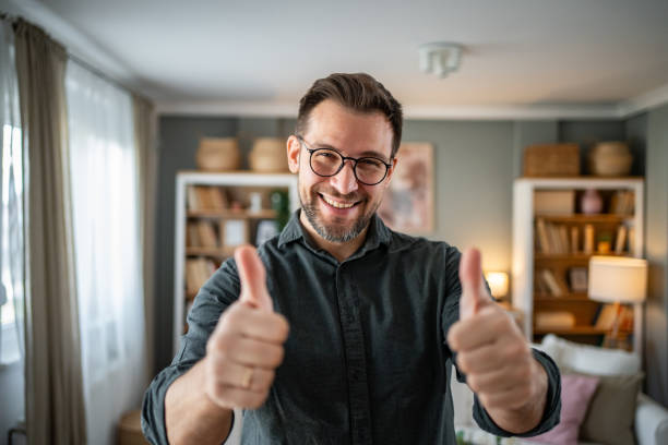 istock Man talking and looking at camera, recording video for his vlog 2186609320