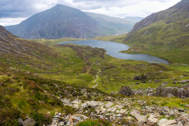 istock Cwm Idwal lake seen from the rugged hiking trail close to The Devil's Kitchen viewpoint in North Wales. 2186609364