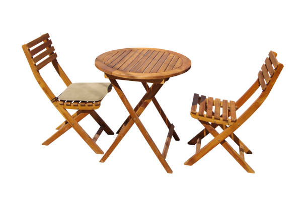 istock Wooden table with chairs isolated on white background. 2186609645