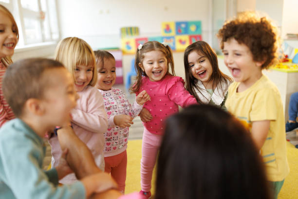 istock Group of children have fun with their animator 2186610714