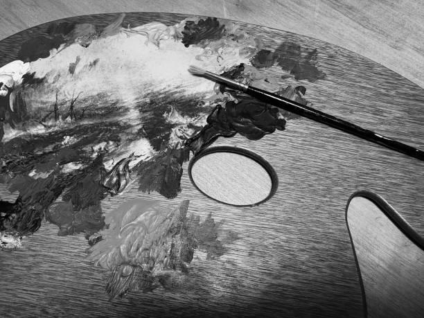 An artists paints and a paintbrush