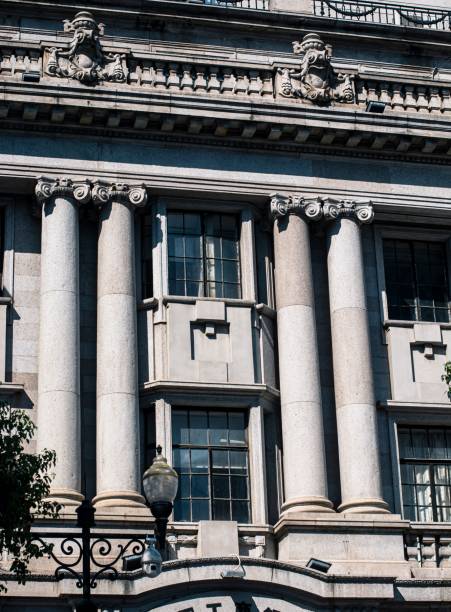 istock Ornate historical building facade with columns and windows. 2186620051