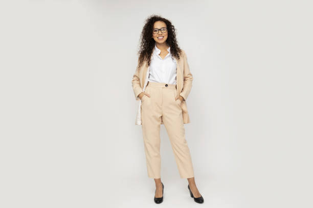 istock Attractive businesswoman in a suit on a light background 2186622232