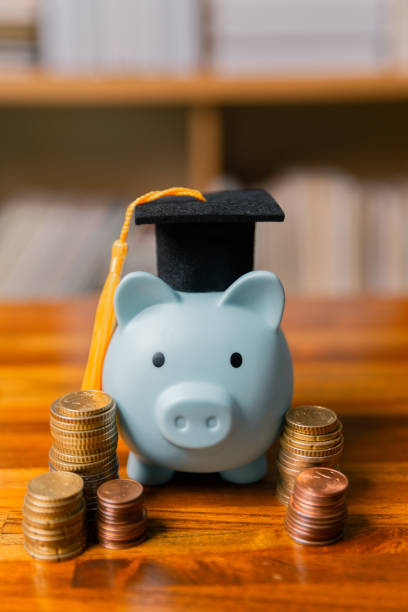 istock Planning for education abroad involves saving money and making wise investments in finance, which can lead to graduation success, future wealth, cognitive growth, and well-managed budget. hat, idea 2186624382
