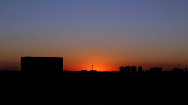 istock Silhouette cityscape on a sunset on background 2186625194