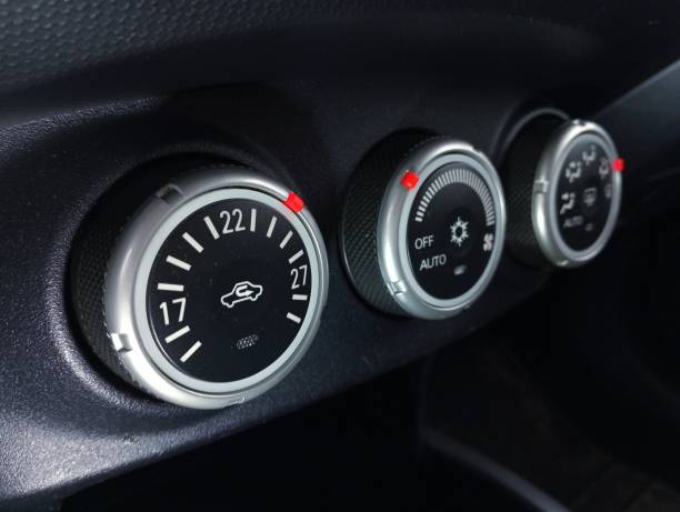 istock Car air conditioner control unit. Buttons on the control panel in the car. 2186626015