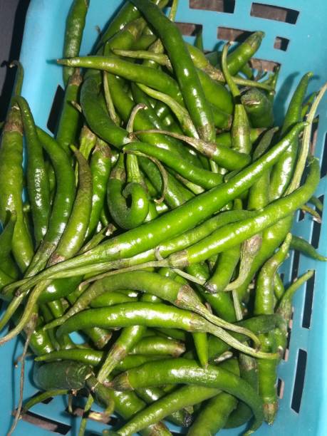 istock The shiny green chilies view on the basket 2186626995