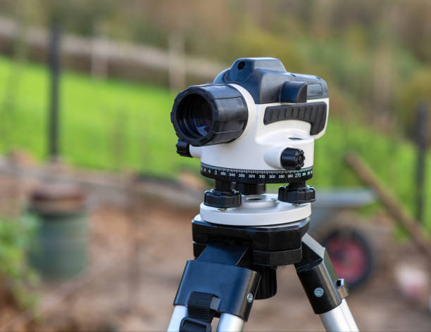 Surveyor equipment theodolite on the construction site. Optical measurement tools.