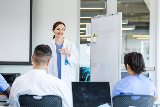 istock Confident doctor teaches class at medical school 2186628233