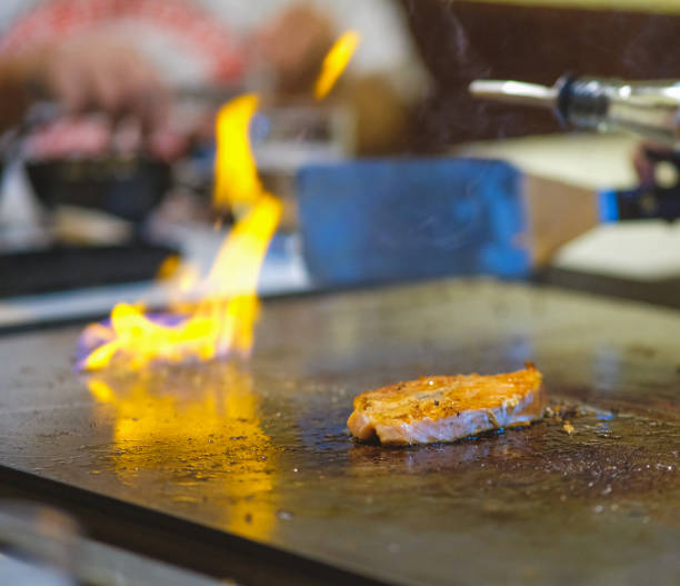 istock Grilled salmon in a teppanyaki restaurant. 2186629066