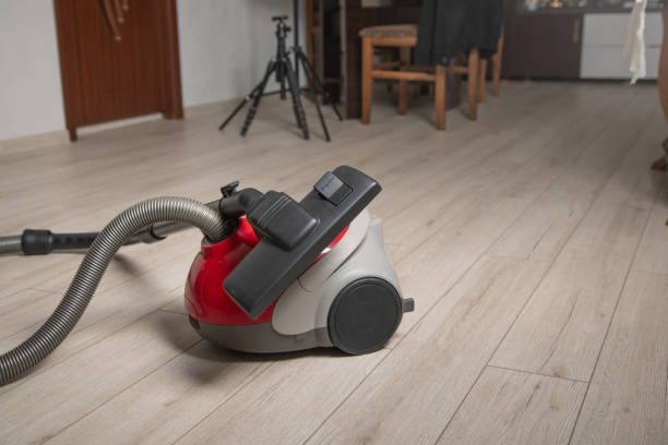 istock Vacuum cleaner on the laminate floor. 2186630369