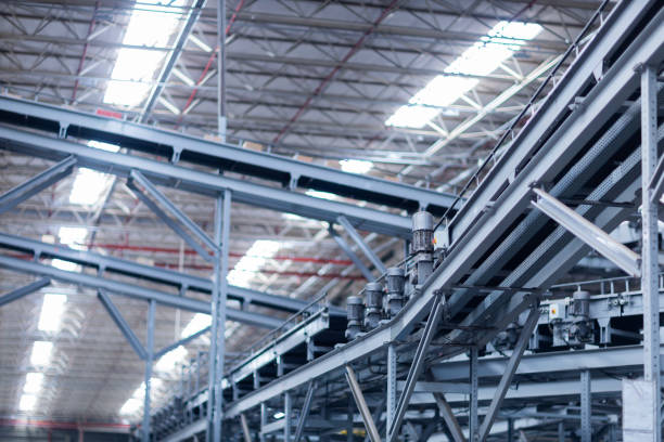 istock View of modern conveyor belts transporting boxes in a large warehouse ready for delivery. logistics. 2186632485