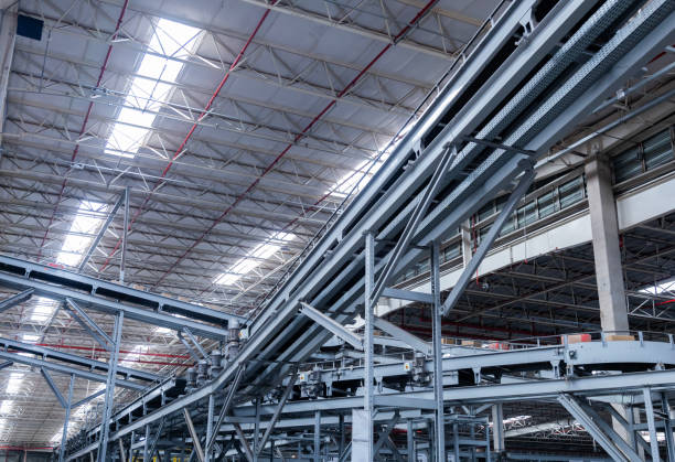 istock View of modern conveyor belts transporting boxes in a large warehouse ready for delivery. logistics. 2186632554