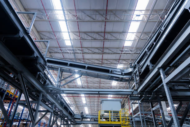 istock View of modern conveyor belts transporting boxes in a large warehouse ready for delivery. logistics. 2186632641