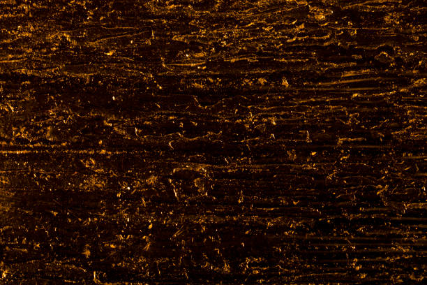 gold veins on a dark background