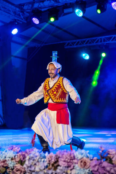 istock A Turkish folk dancer presents a Turkish custom on stage! 2186638489