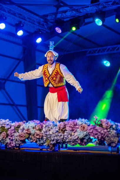 istock A Turkish folk dancer presents a Turkish custom on stage! 2186638502