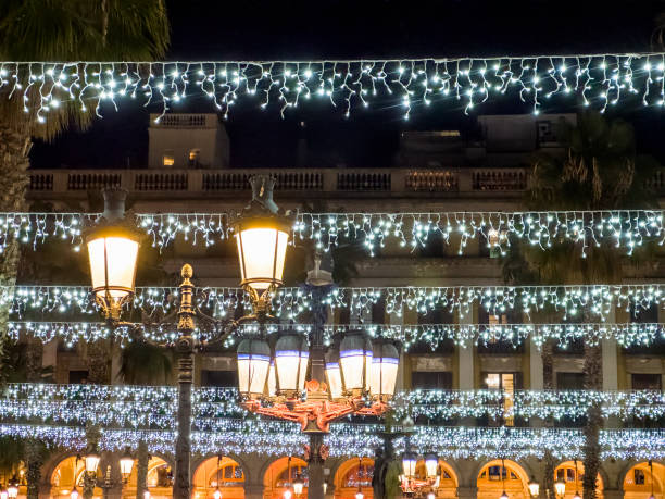 istock City square decorated with Christmas light at night 2186639776