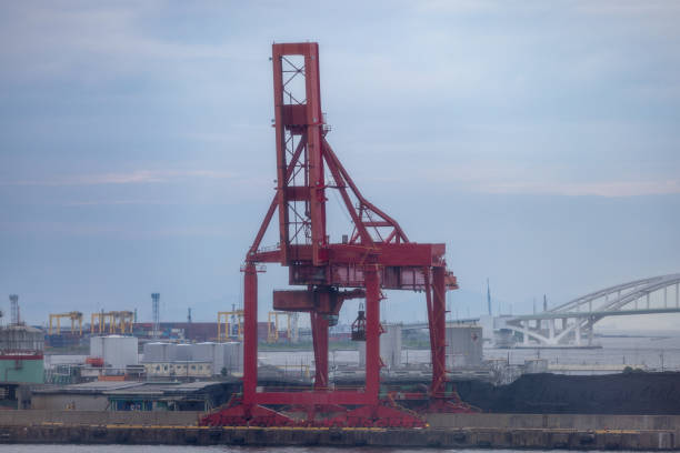 istock Red Industrial Shipping Crane at a Harbor 2186641294