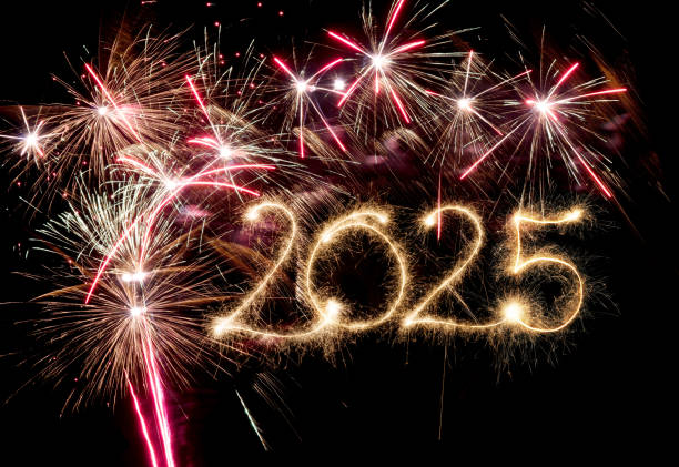 istock Sparkler Happy New Year 2025 with fireworks 2186644071