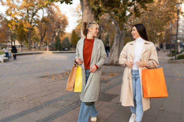 istock Female friends shopping 2186648027