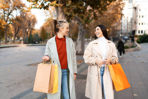istock Female friends shopping 2186648076