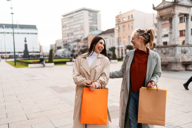 istock Female friends shopping 2186648160