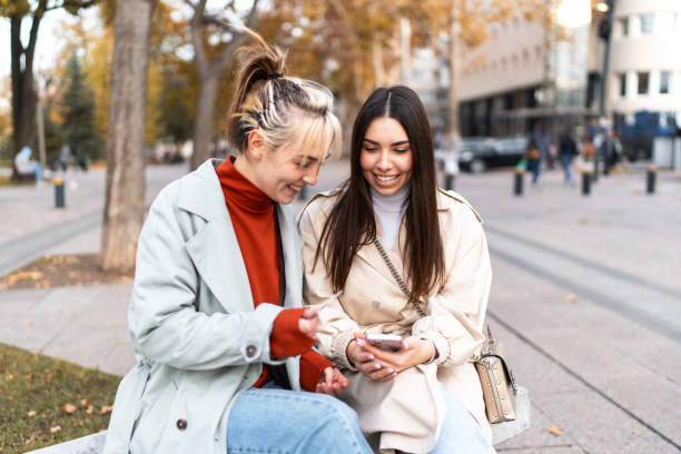 istock Young women having fun while shopping online 2186649525
